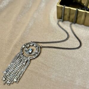 Rhinestone tassle fringe necklace. Art Deco motif